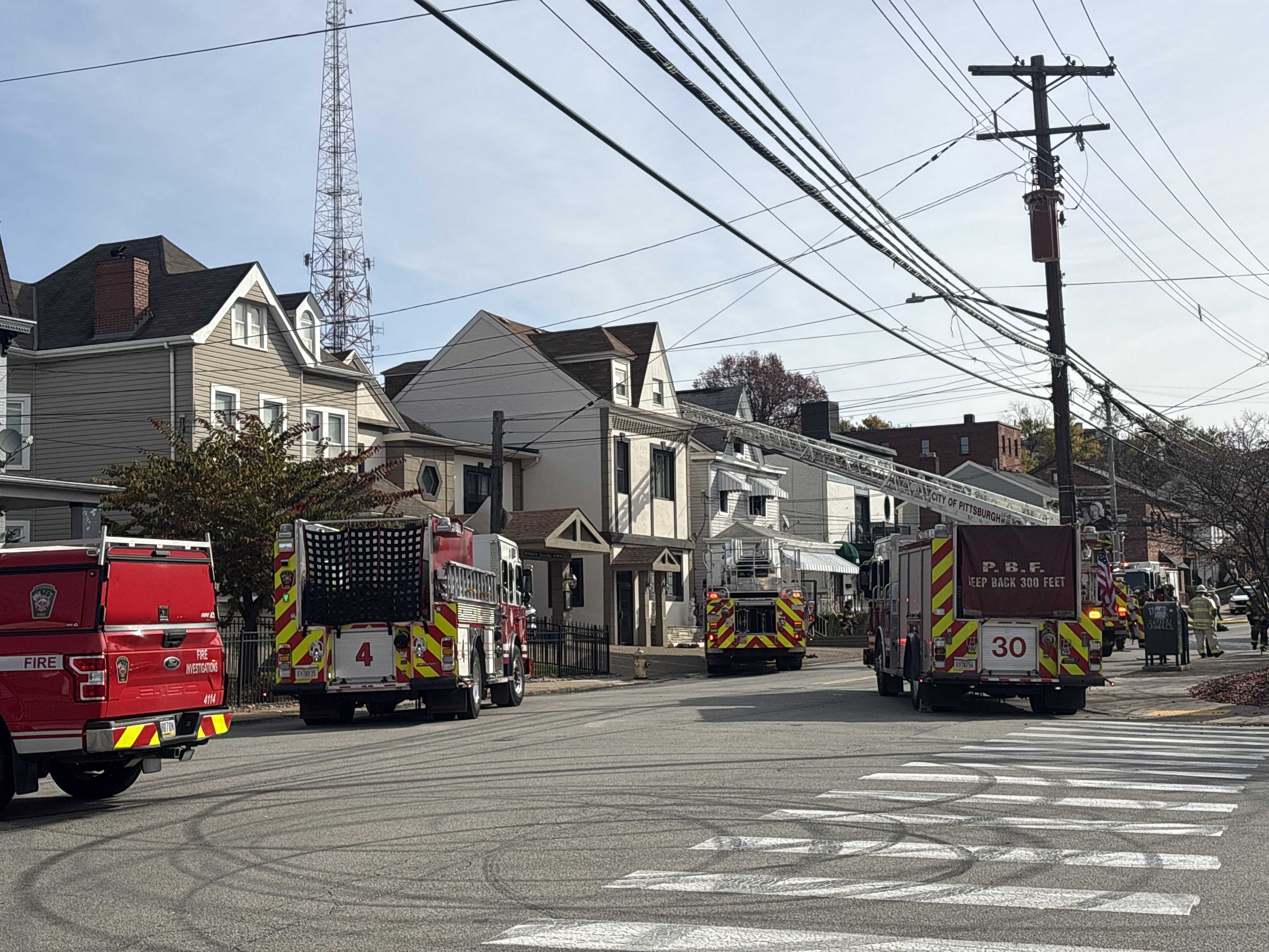 Firefighters responding to a residential fire in Pittsburgh